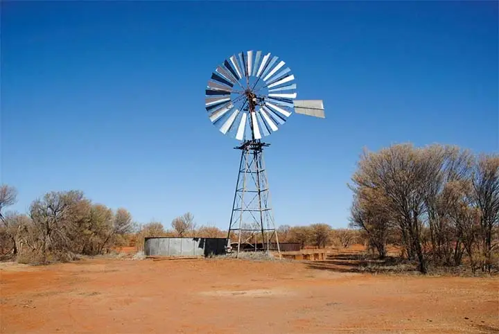 Classic outback windmill with water tank